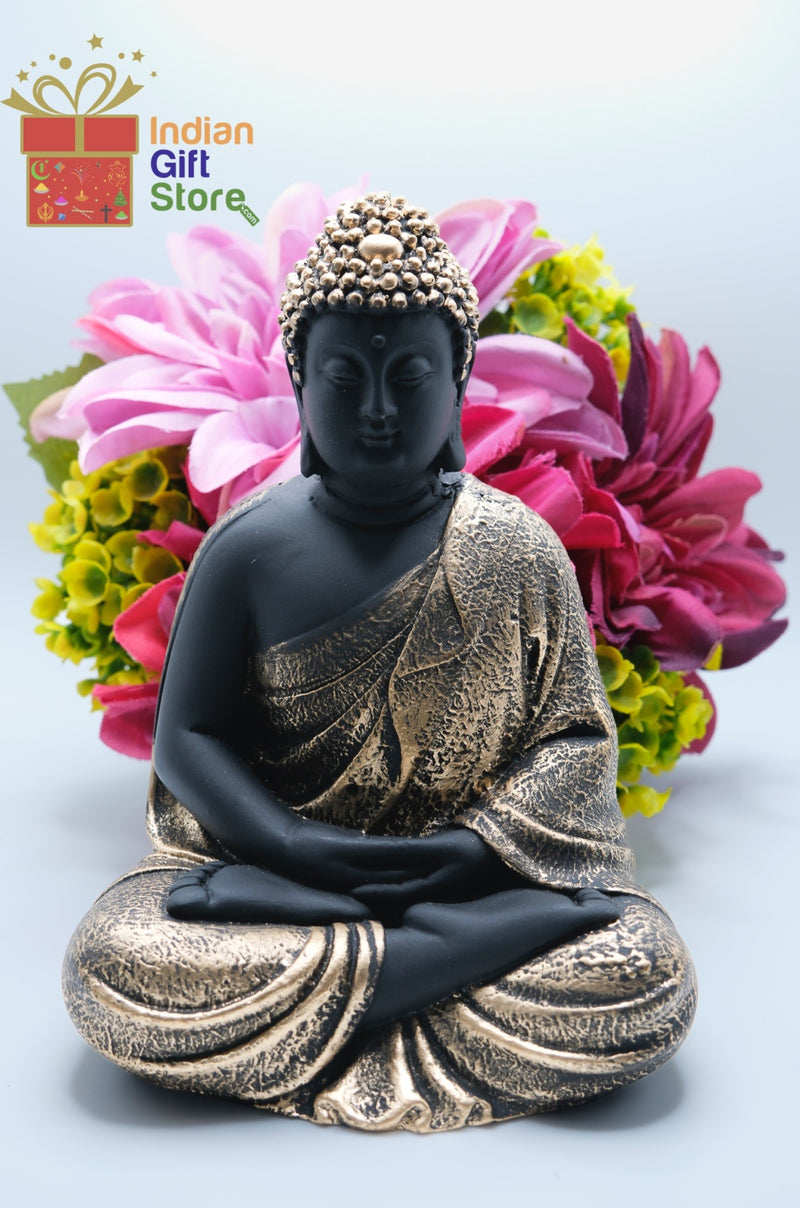 Black and gold Gautama Buddha statue