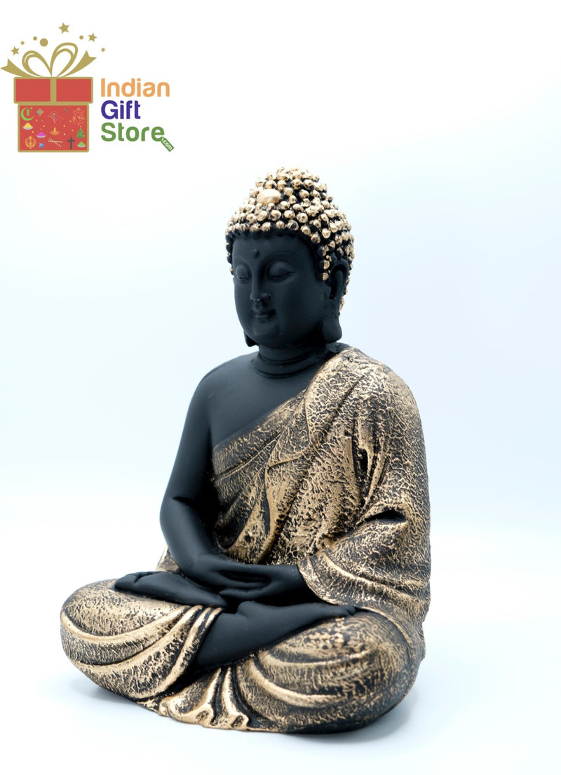 Black and gold Gautama Buddha statue